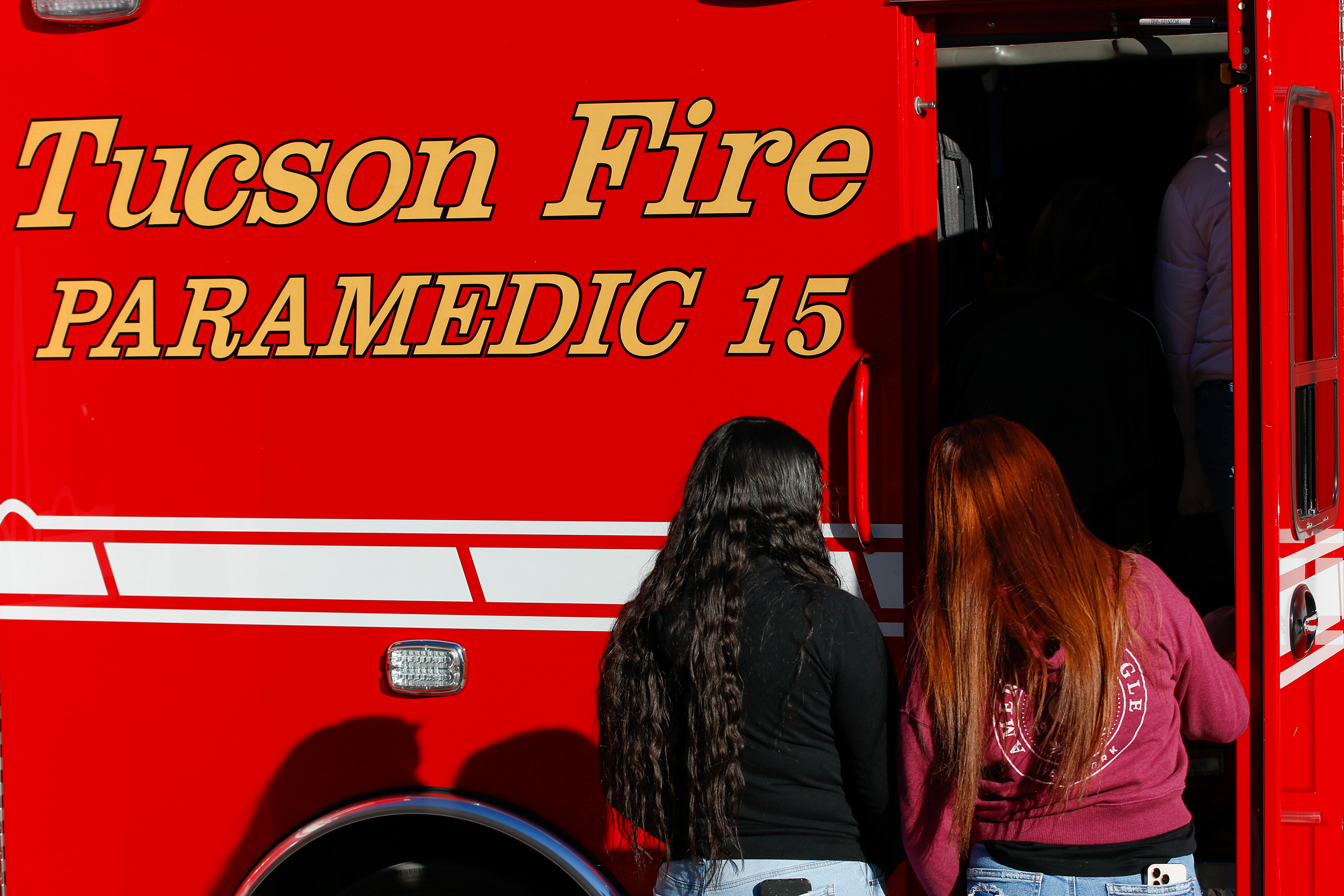 Students look inside a fire truck