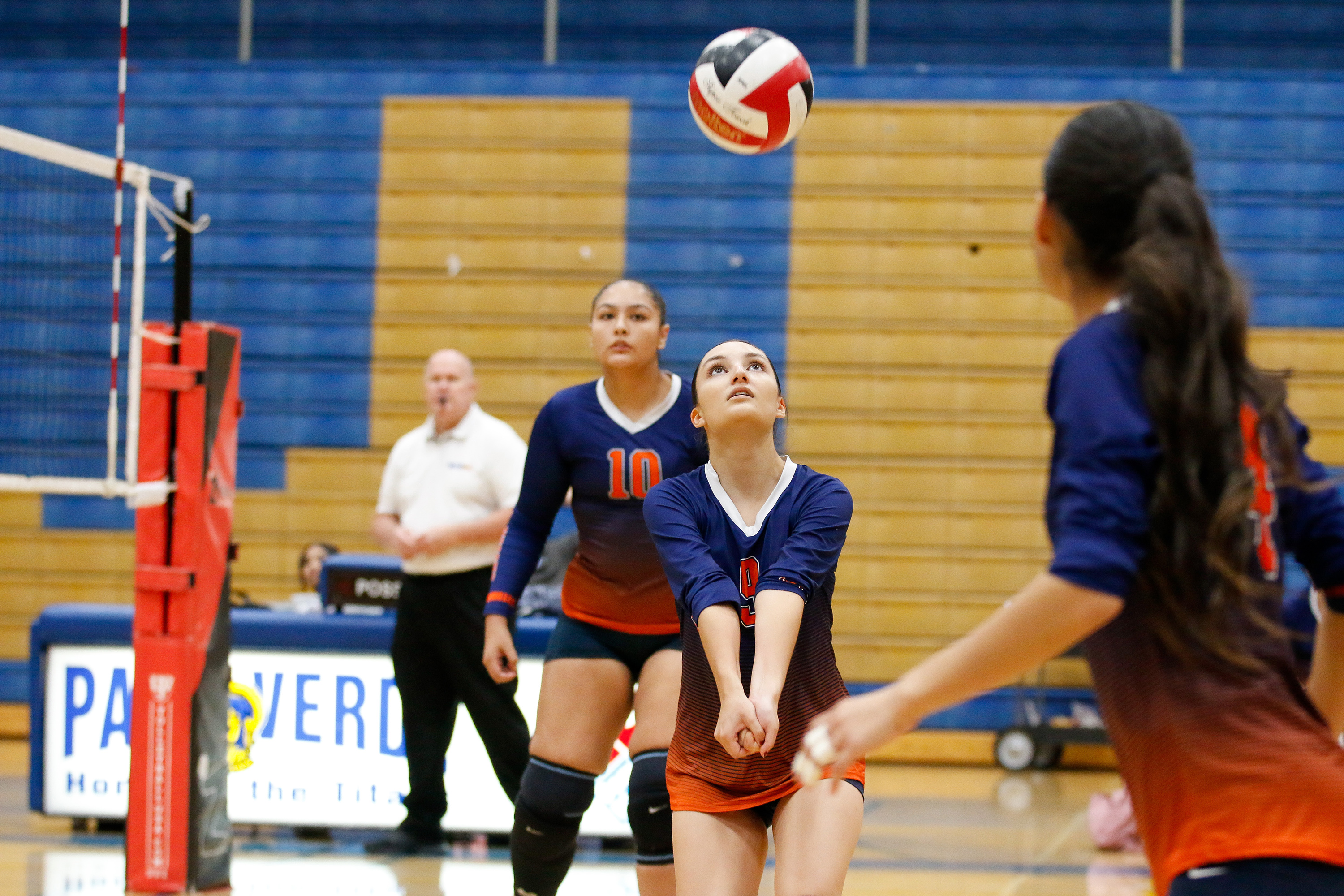 A Cholla volleyball player prepares to hit the ball