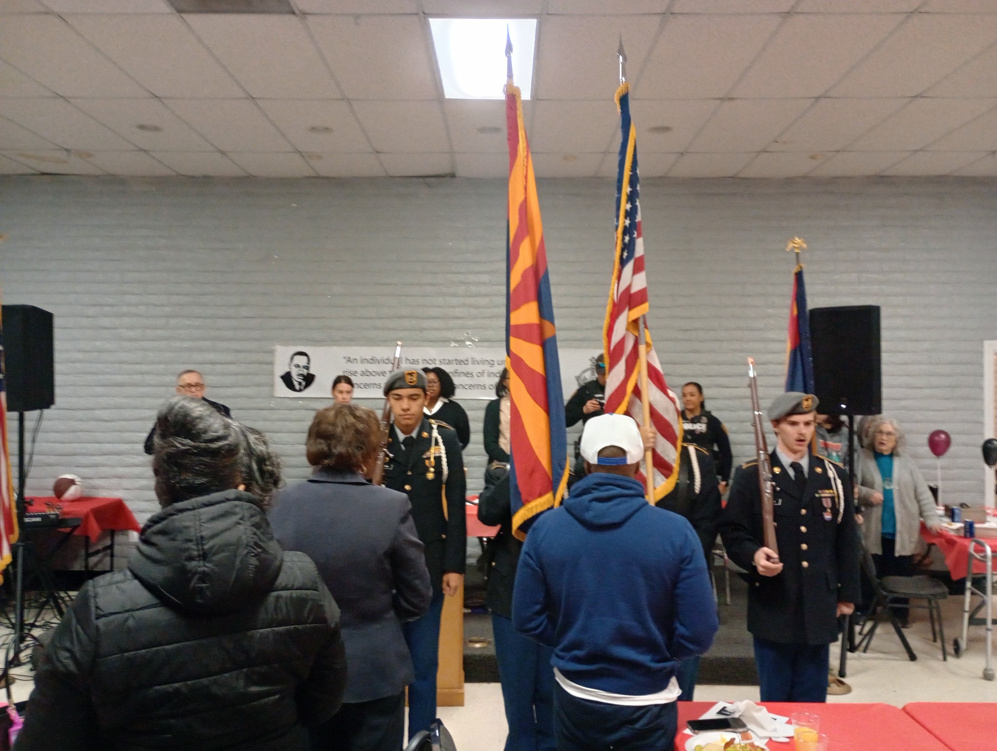 Cholla cadets stand with the US and Arizona flags