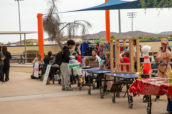 Students browse tables at the resource fair